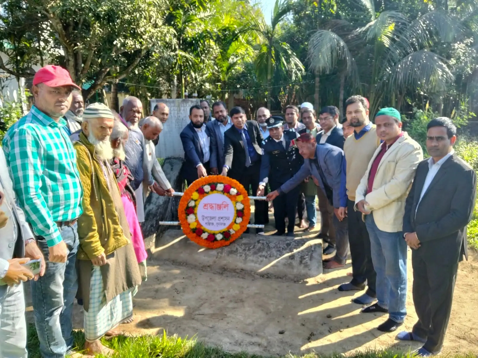 শান্তিগঞ্জে শহীদ তালেব ও কৃপেন্দ্র দাশের সমাধিতে পুষ্পস্তবক অর্পণ