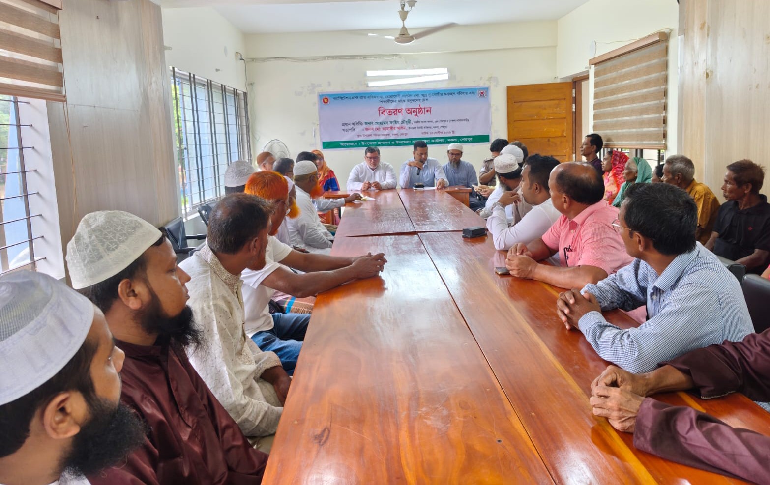 নকলায় সমাজসেবার এককালিন অনুদান বিতরণ